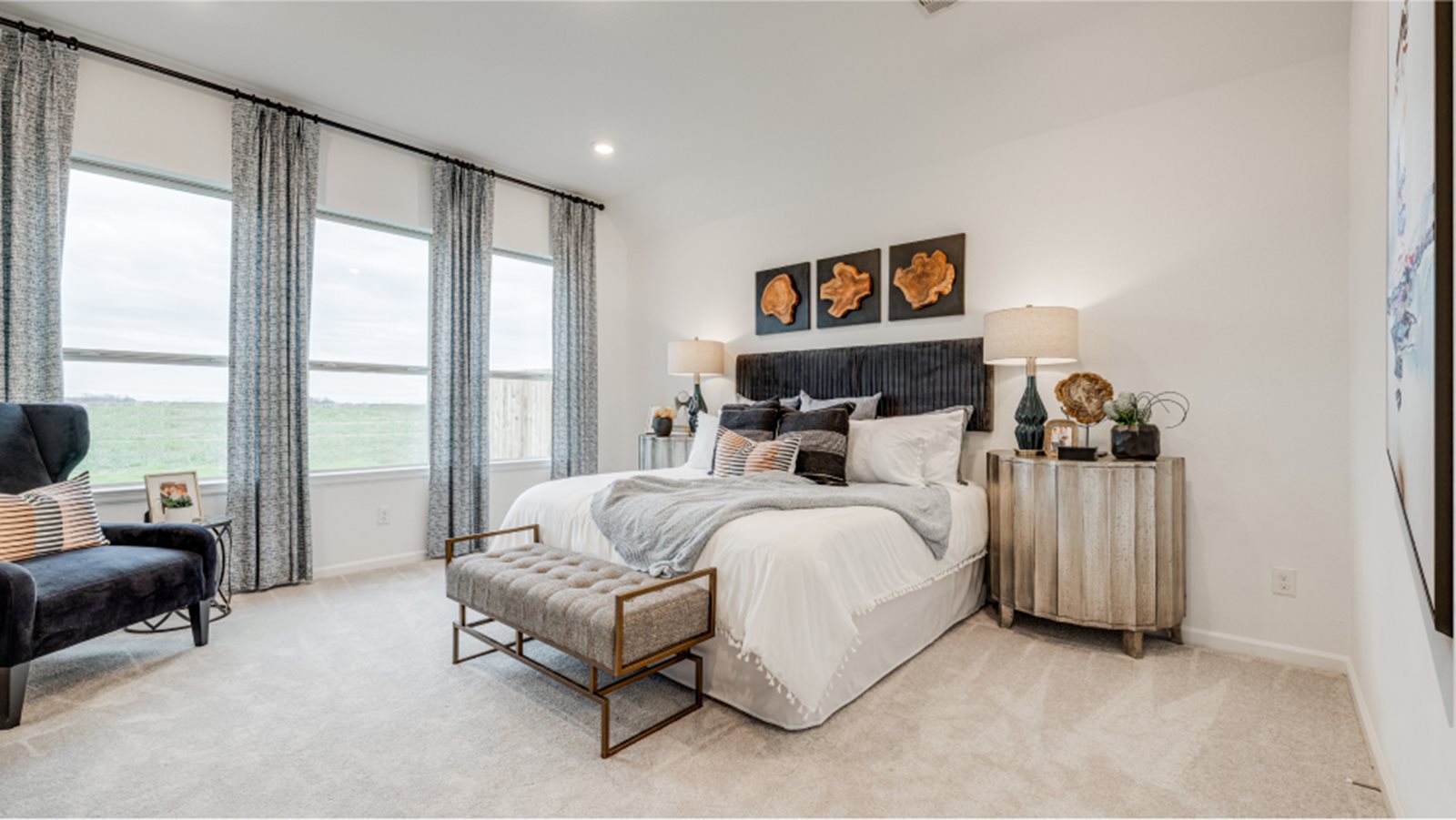 Photo of the owner's suite inside the Cabot model home by Lennar Homes in Harvest Green in Richmond, Texas.