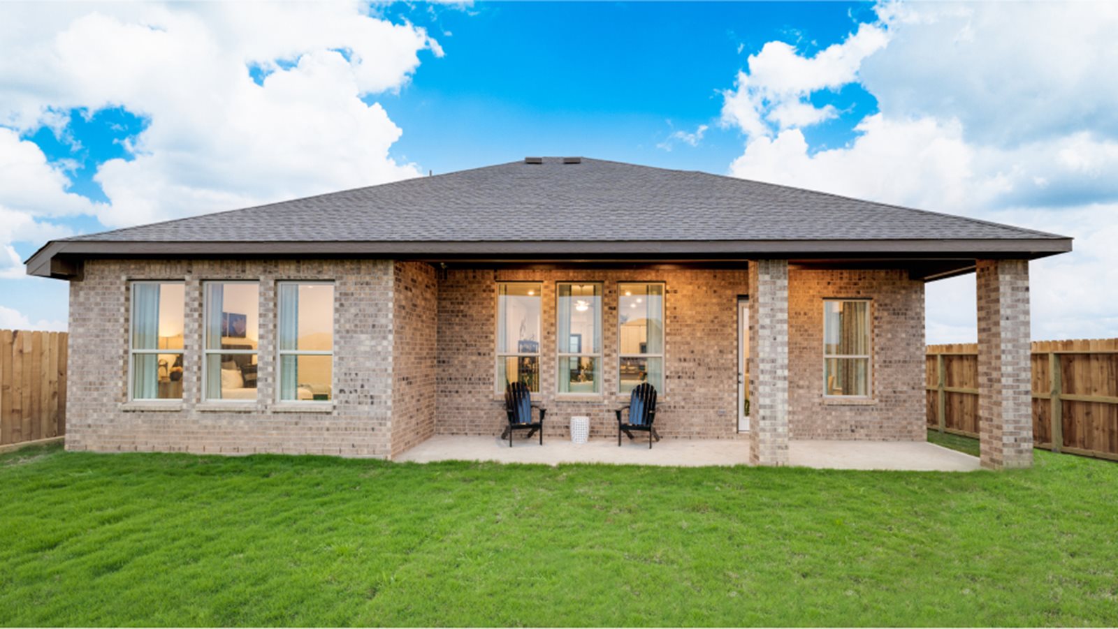 Photo of the exterior and backyard of the Cabot model home by Lennar Homes in Harvest Green in Richmond, Texas.